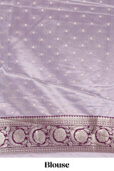 Lavender floral design banarasi silk saree with contrast border and matching floral printed blouse