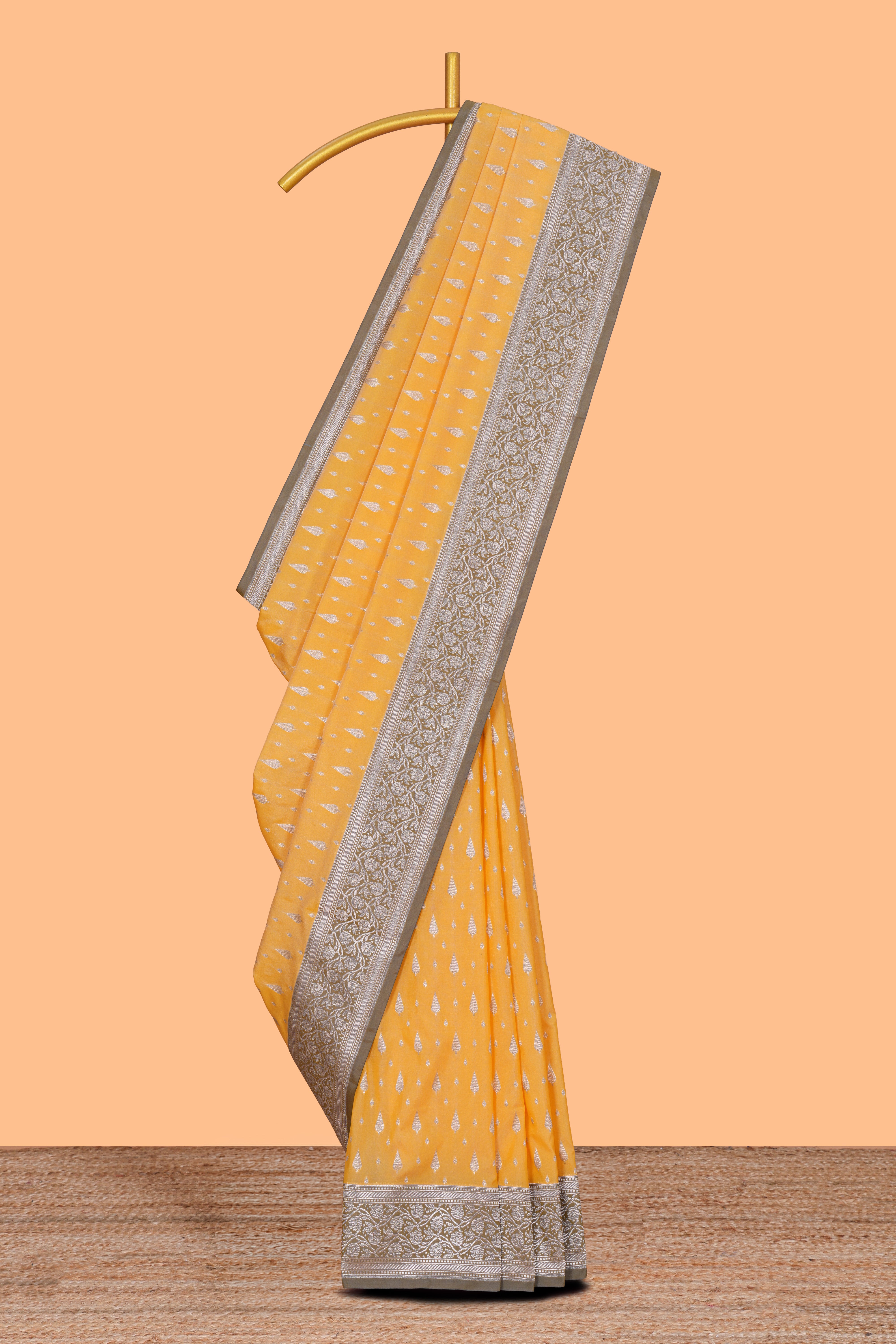 Yellow zari motifs design banarasi silk saree with contrast border and matching blouse