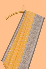 Yellow zari motifs design banarasi silk saree with contrast border and matching blouse