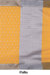Yellow zari motifs design banarasi silk saree with contrast border and matching blouse