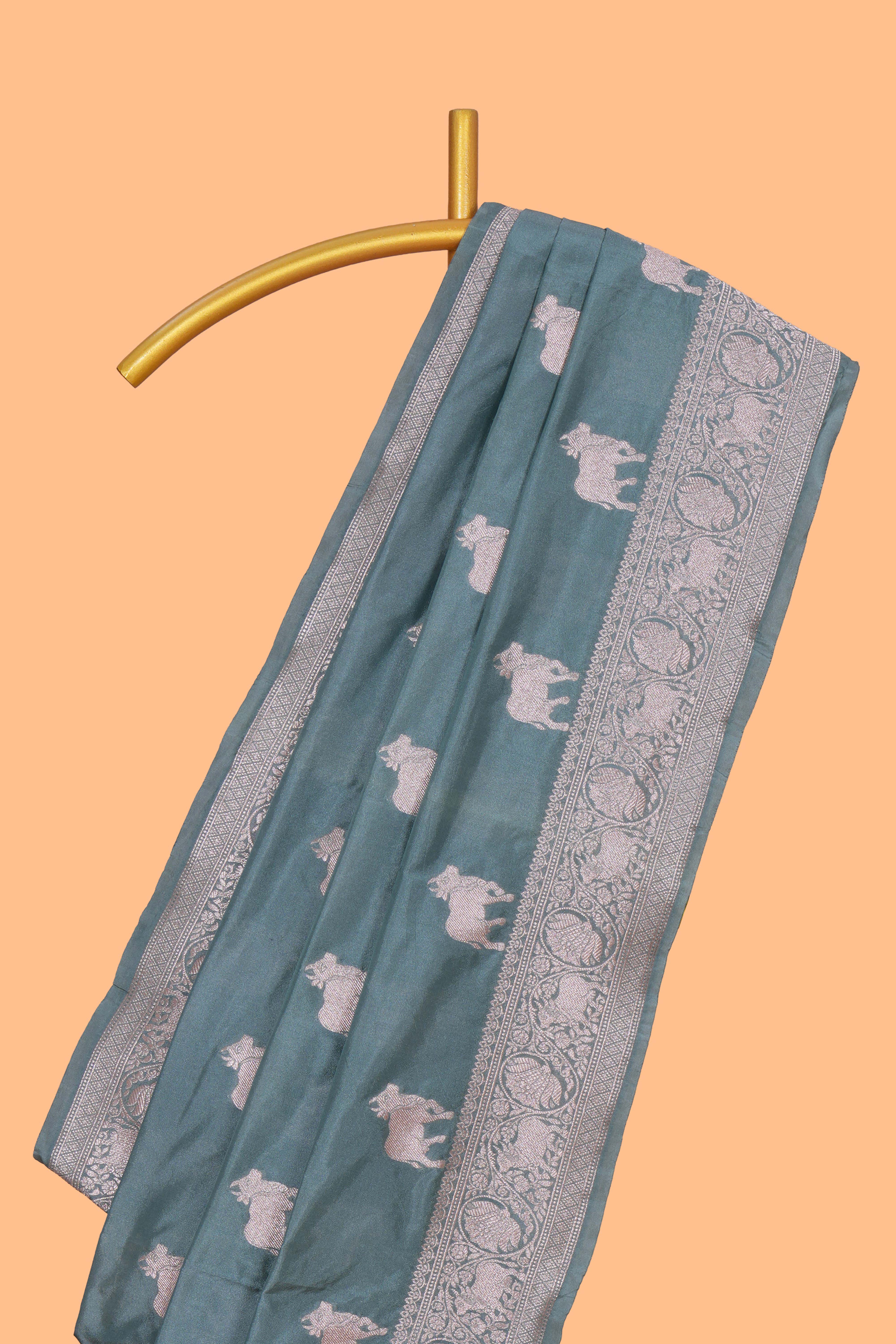 Jade green cow zari motifs design banarasi silk saree with self border and matching blouse