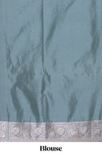 Jade green cow zari motifs design banarasi silk saree with self border and matching blouse