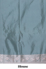 Jade green cow zari motifs design banarasi silk saree with self border and matching blouse