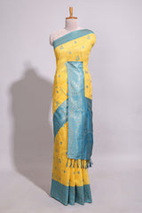 Yellow zari motifs design banarasi silk saree with contrast zari border and buttas blouse
