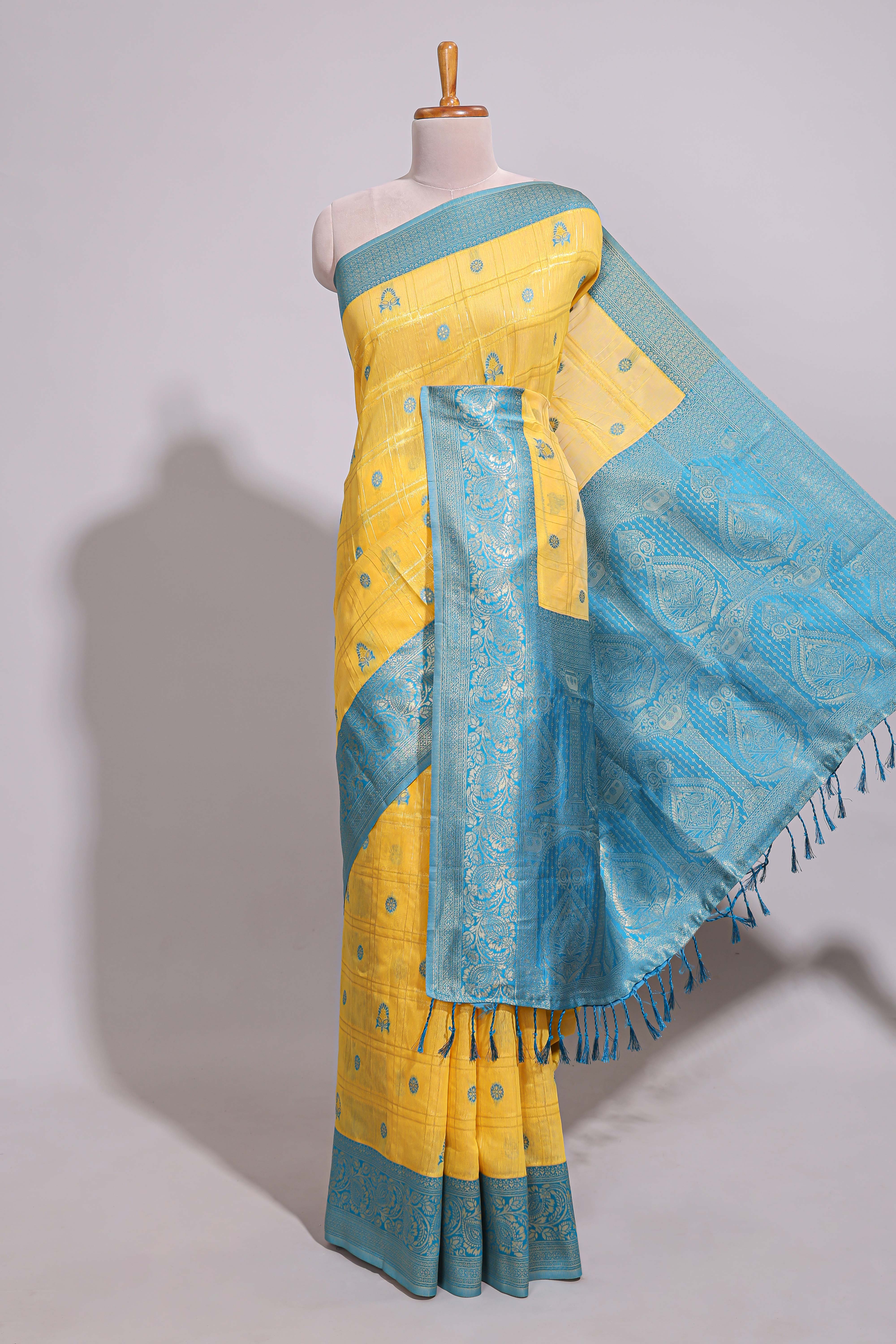 Yellow zari motifs design banarasi silk saree with contrast zari border and buttas blouse