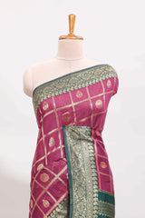 Magenta all-over checked grid pattern and butta banarasi silk saree with green contrast floral zari border and buttas blouse