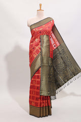Red shade checked and butta banarasi silk saree with black contrast geometric zari border and buttas blouse