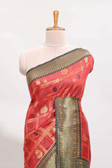 Red shade checked and butta banarasi silk saree with black contrast geometric zari border and buttas blouse