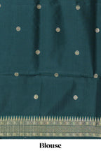 Green shade checked and butta banarasi silk saree with contrast geometric zari border and buttas blouse