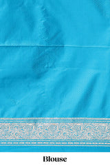 Blue shade floral designed banarasi silk saree with self zari border and blouse