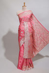 Peach floral designed banarasi silk saree with self zari border and blouse