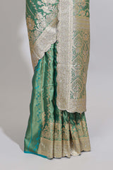 Sea green striped floral design banarasi silk saree with self zari border and blouse