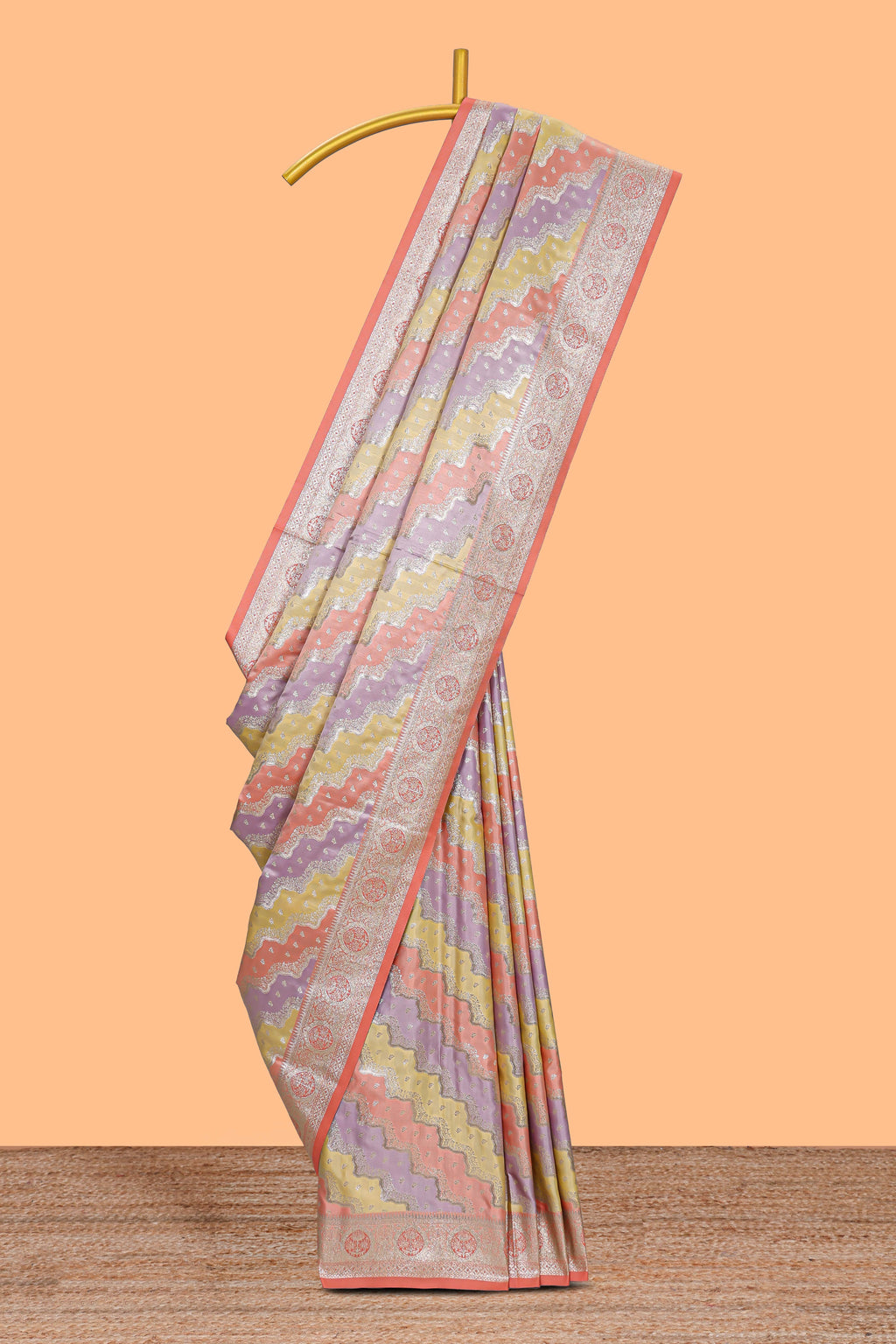 Peach multicolor striped banarasi silk saree with self zari border and  matching blouse