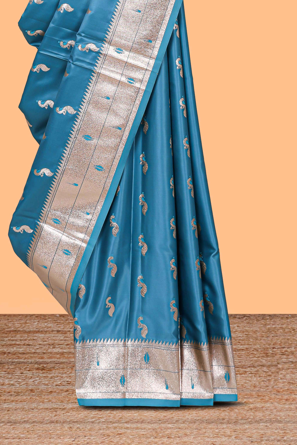 Blue butta designed banarasi silk saree with self zari border and  matching blouse