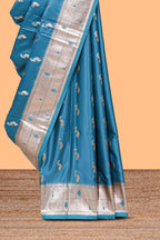 Blue butta designed banarasi silk saree with self zari border and  matching blouse