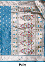 Blue butta designed banarasi silk saree with self zari border and  matching blouse