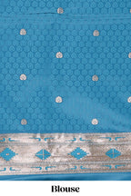 Blue butta designed banarasi silk saree with self zari border and  matching blouse