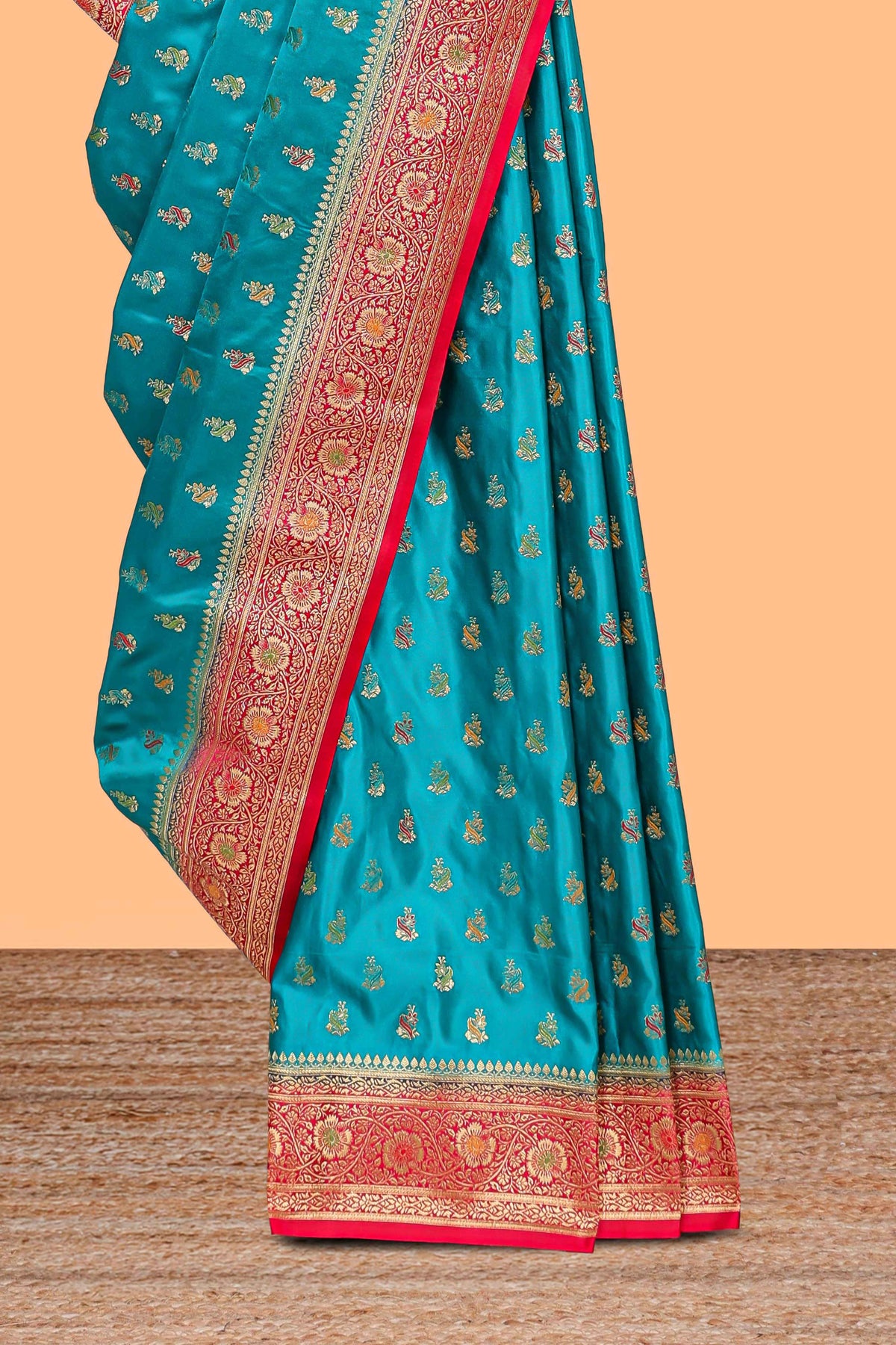 Teal blue banarasi silk saree with contrast zari border and blouse