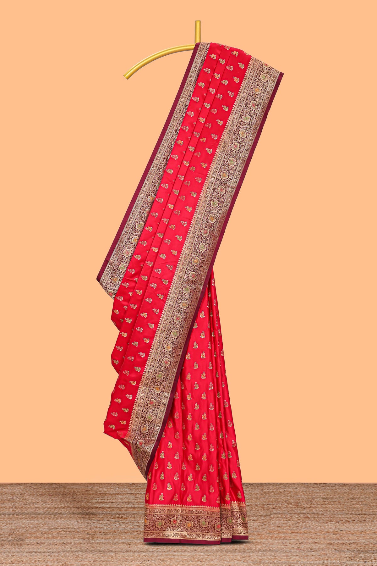 Red banarasi silk saree with contrast zari border and blouse
