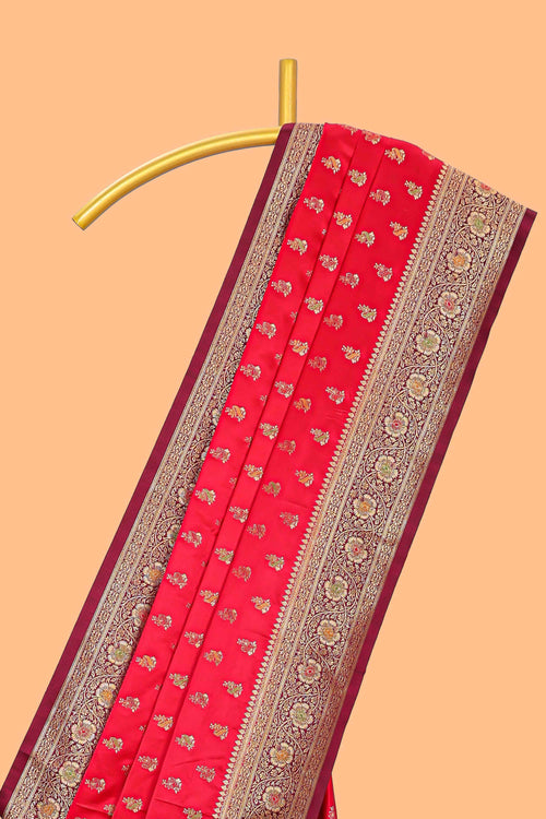 Red banarasi silk saree with contrast zari border and blouse