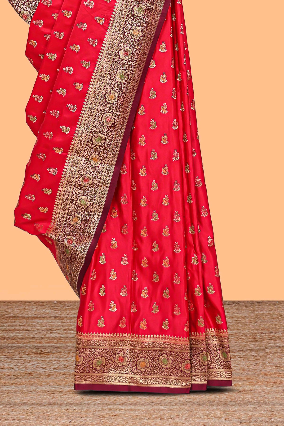 Red banarasi silk saree with contrast zari border and blouse