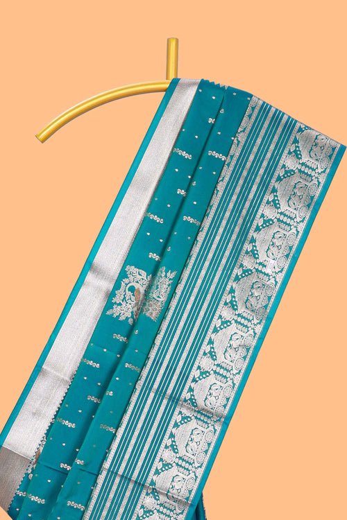 Blue unique designed banarasi silk saree with self zari border and matching blouse