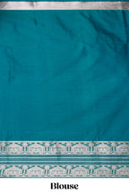 Blue unique designed banarasi silk saree with self zari border and matching blouse