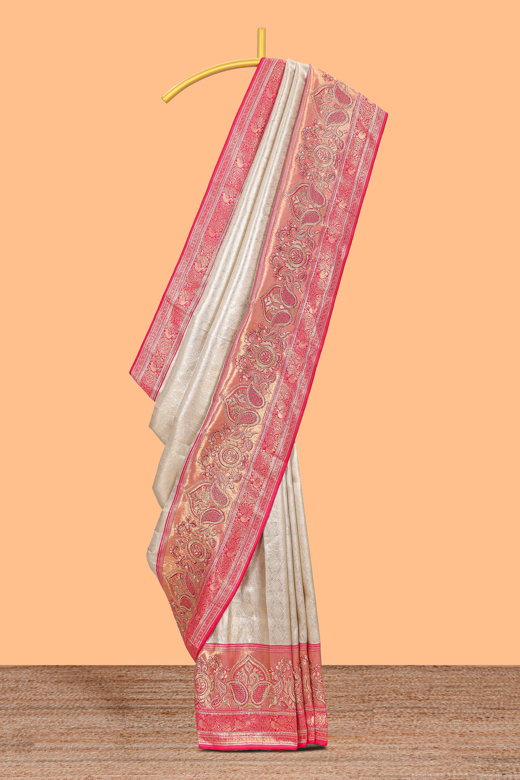 Cream unique designed banarasi silk saree with contrast floral zari border and blouse