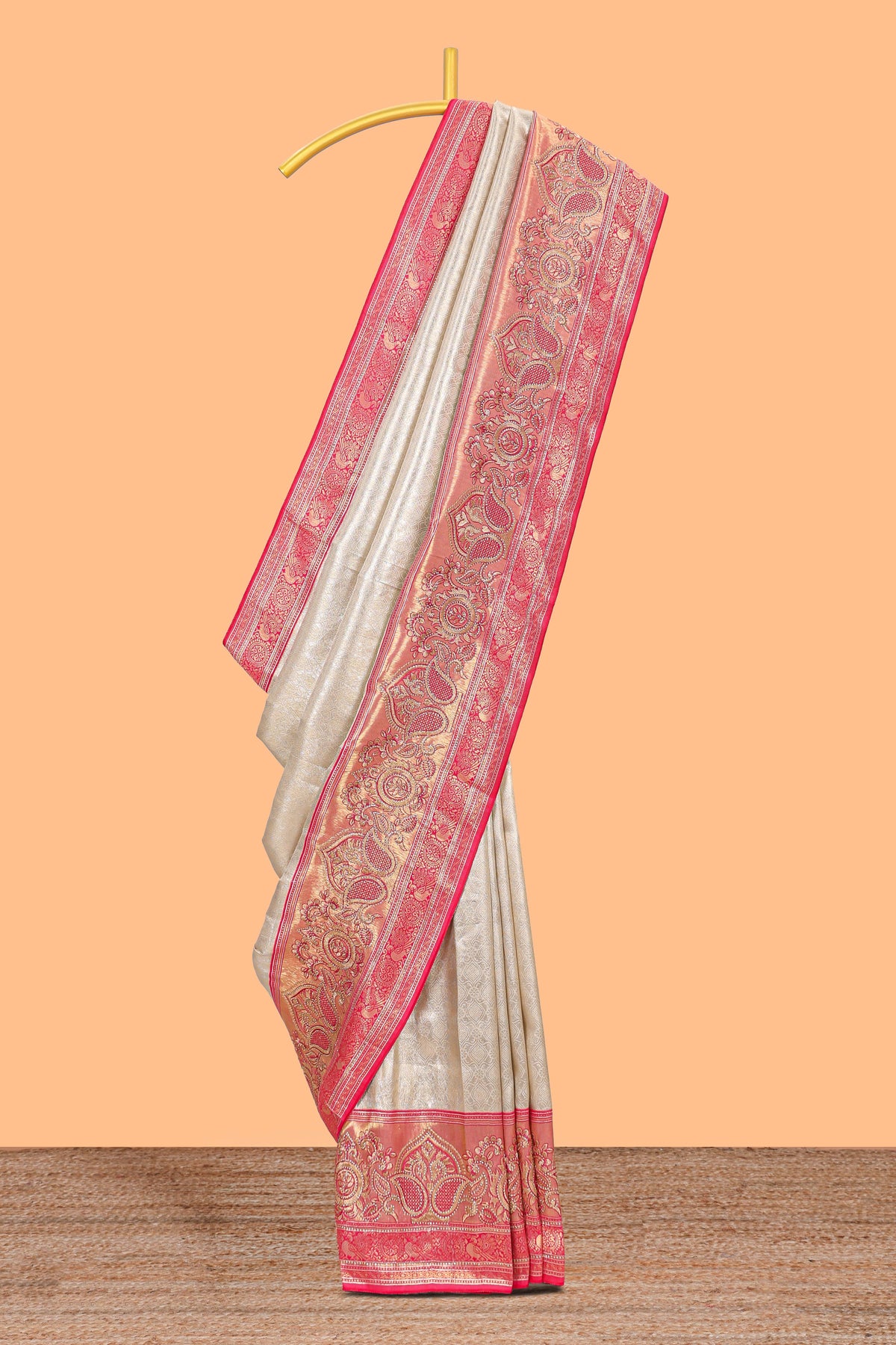Cream unique designed banarasi silk saree with contrast floral zari border and blouse