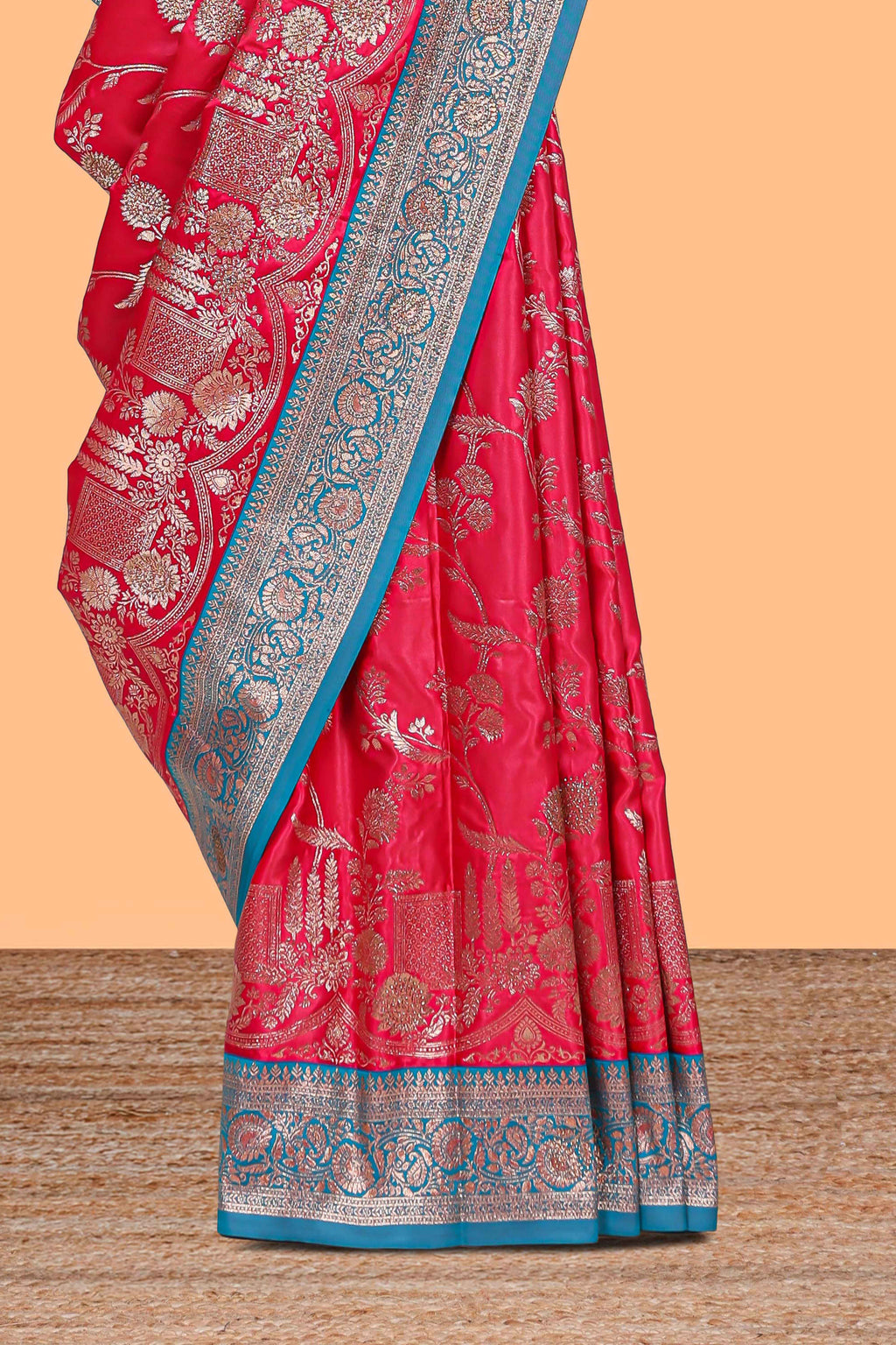 Red floral designed banarasi silk saree with contrast floral zari border and blouse