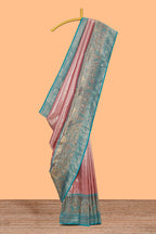 Blush pink unique designed banarasi silk saree with contrast floral zari border and blouse