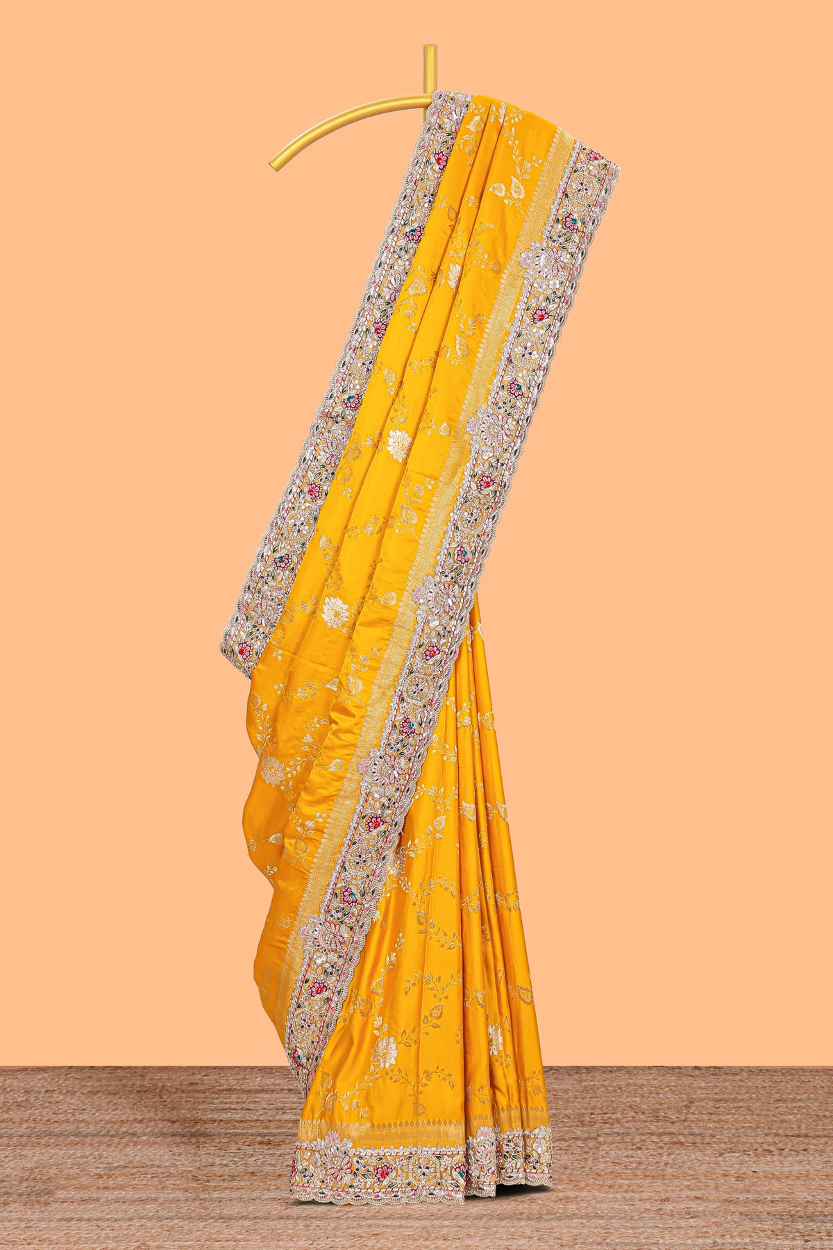 Yellow floral designed banarasi silk saree with self floral embroidery border and matching blouse