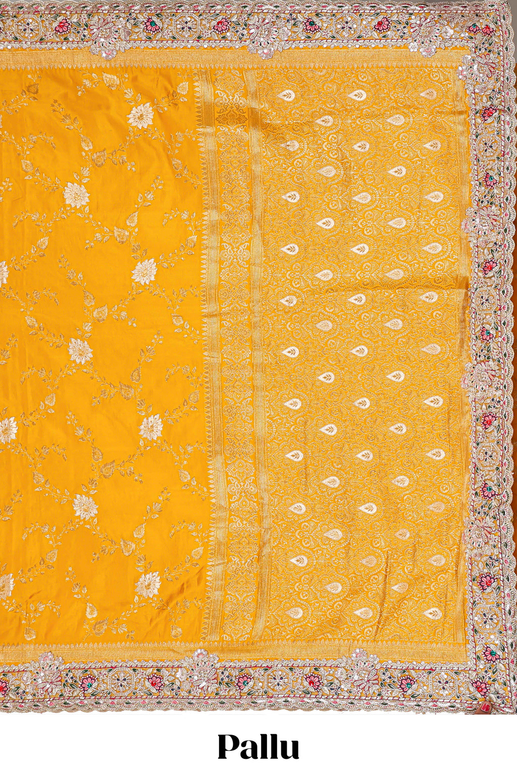Yellow floral designed banarasi silk saree with self floral embroidery border and matching blouse