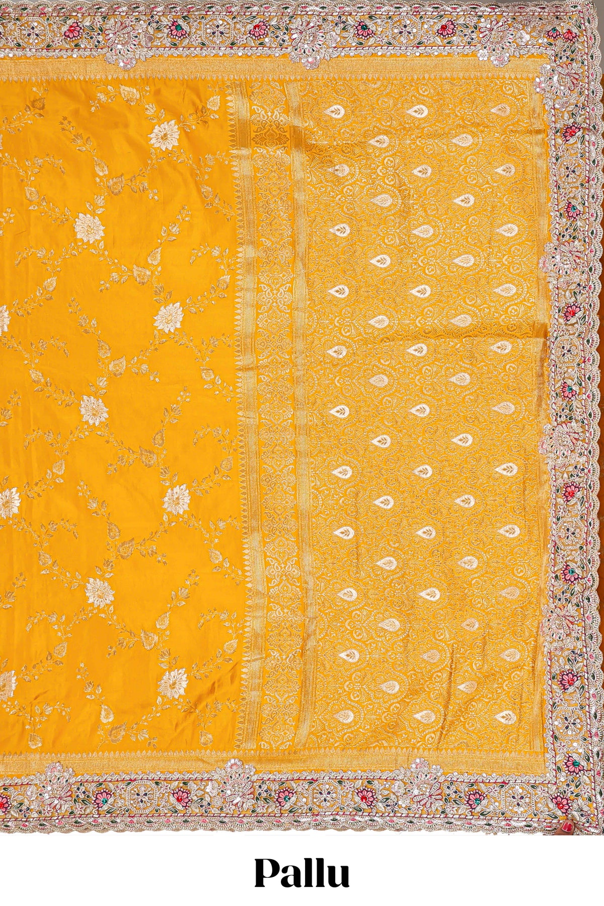 Yellow floral designed banarasi silk saree with self floral embroidery border and matching blouse