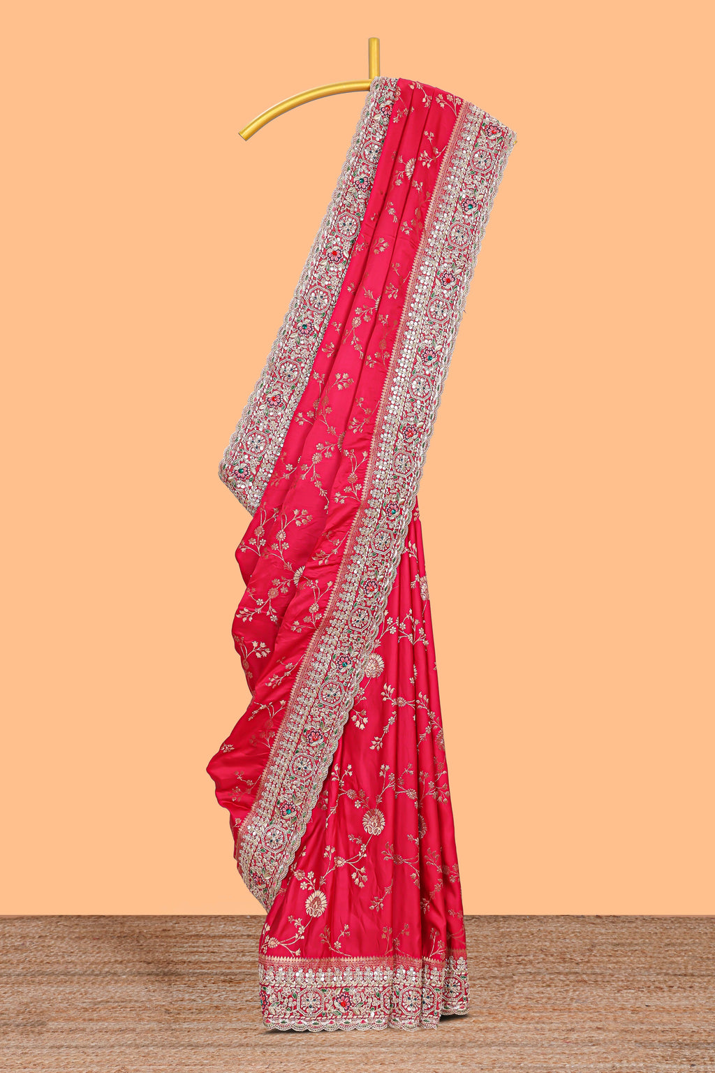 Rani pink floral designed banarasi silk saree with self floral embroidery border and matching blouse