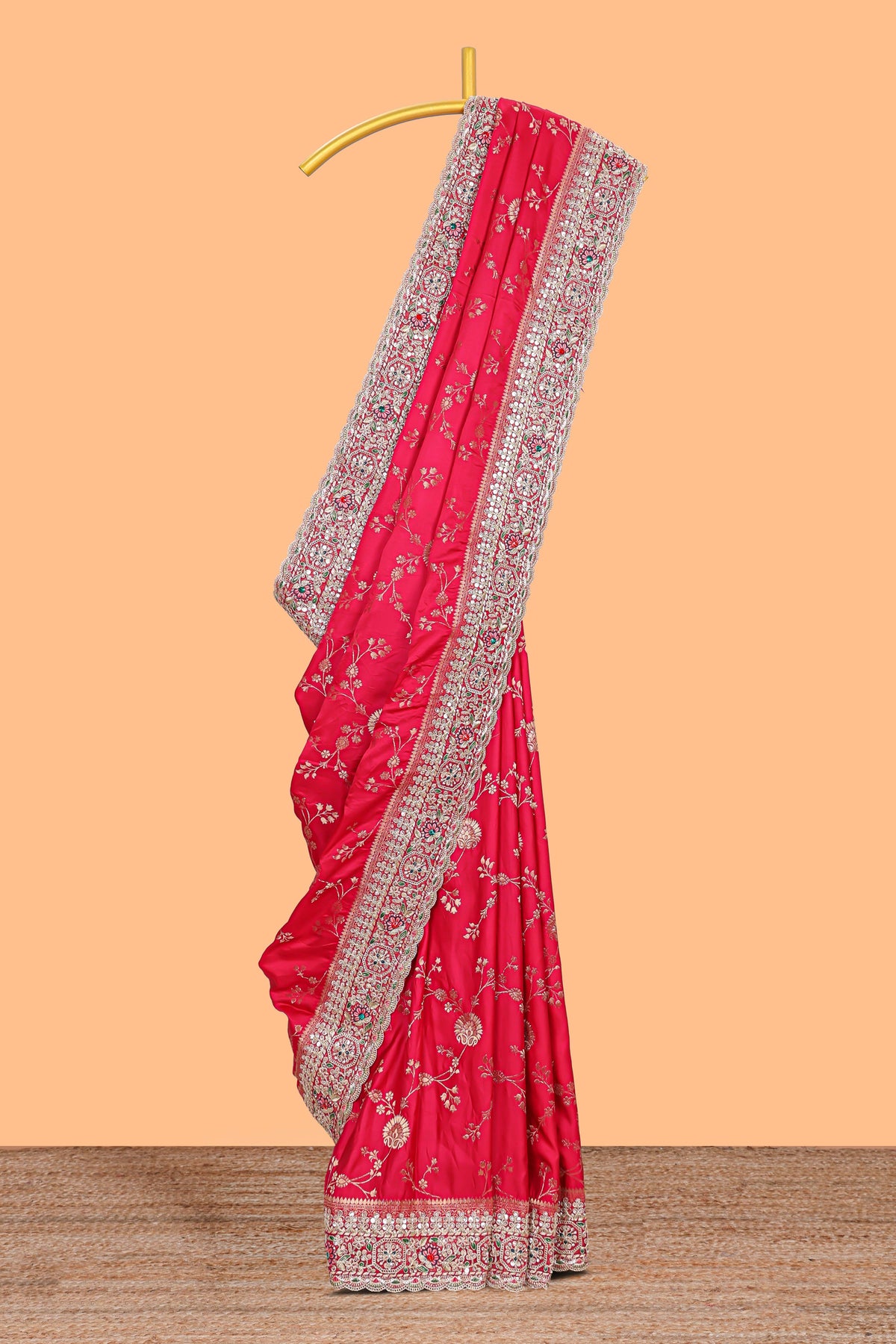 Rani pink floral designed banarasi silk saree with self floral embroidery border and matching blouse