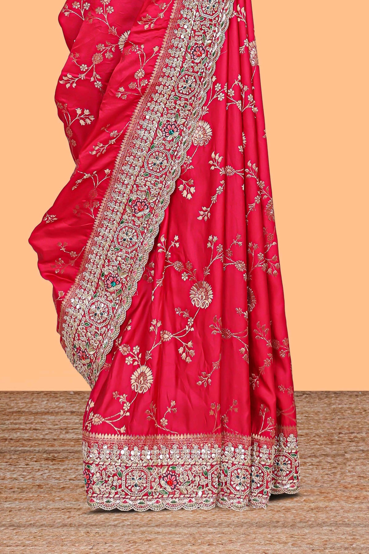 Rani pink floral designed banarasi silk saree with self floral embroidery border and matching blouse