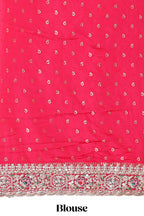 Rani pink floral designed banarasi silk saree with self floral embroidery border and matching blouse