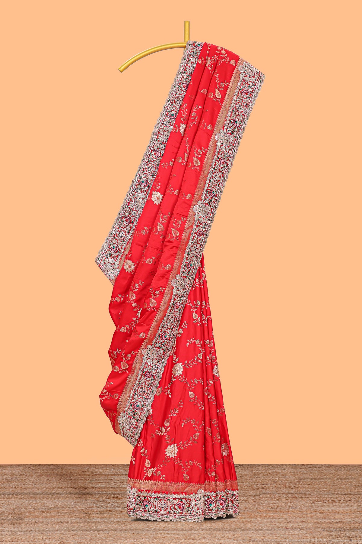 Red floral designed banarasi silk saree with self floral embroidery border and matching blouse