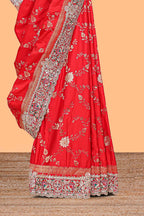 Red floral designed banarasi silk saree with self floral embroidery border and matching blouse
