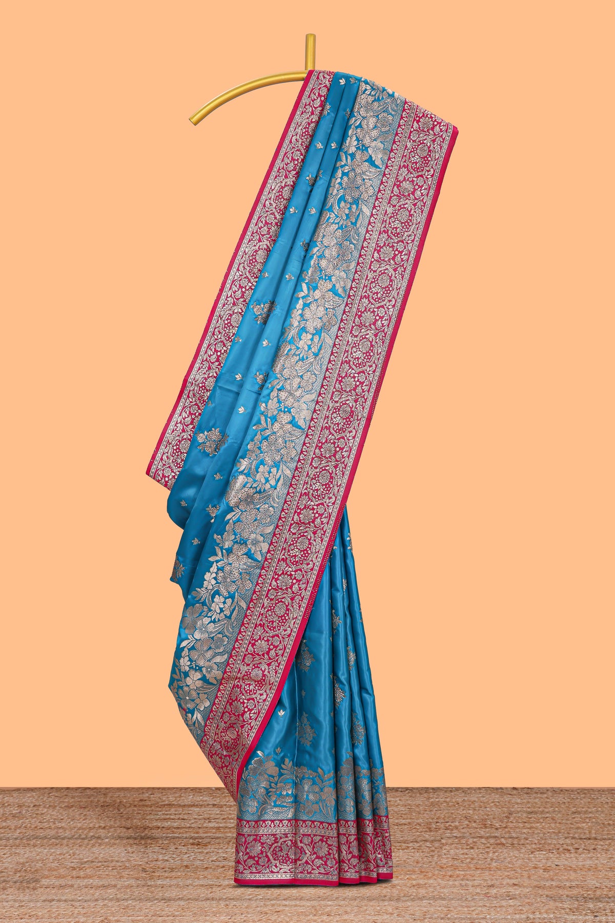 Blue floral designed banarasi silk saree with contrast floral border and matching blouse