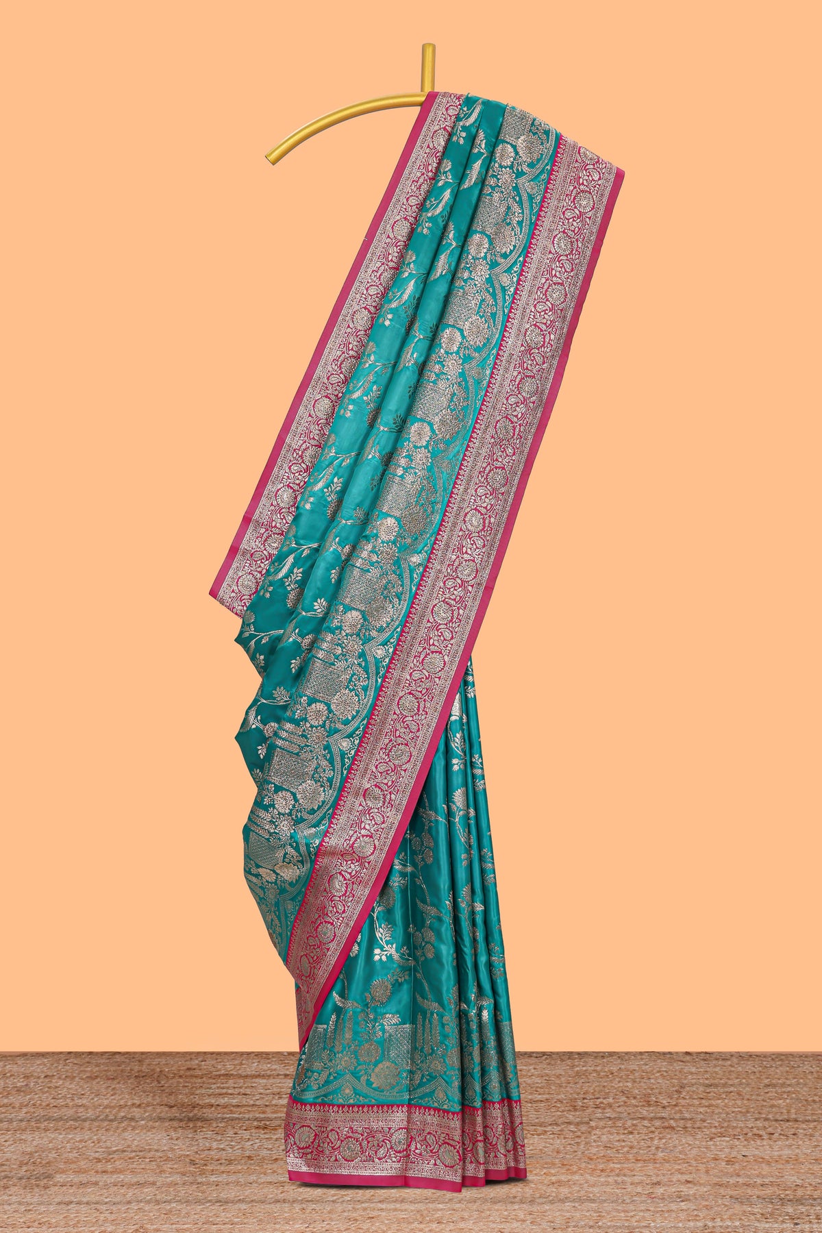 Green floral designed banarasi silk saree with contrast floral border and matching blouse