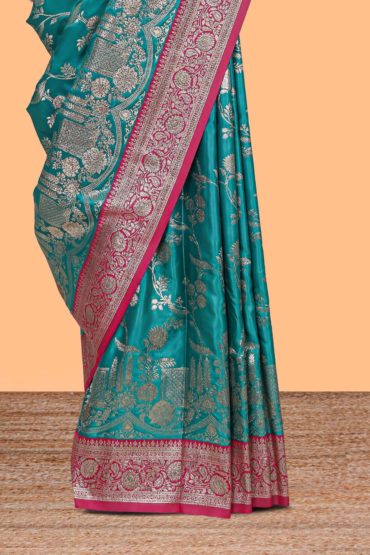 Green floral designed banarasi silk saree with contrast floral border and matching blouse