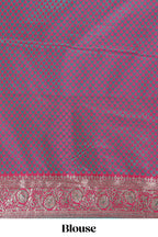 Green floral designed banarasi silk saree with contrast floral border and matching blouse