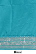 Blue floral designed banarasi silk saree with self floral border and matching blouse