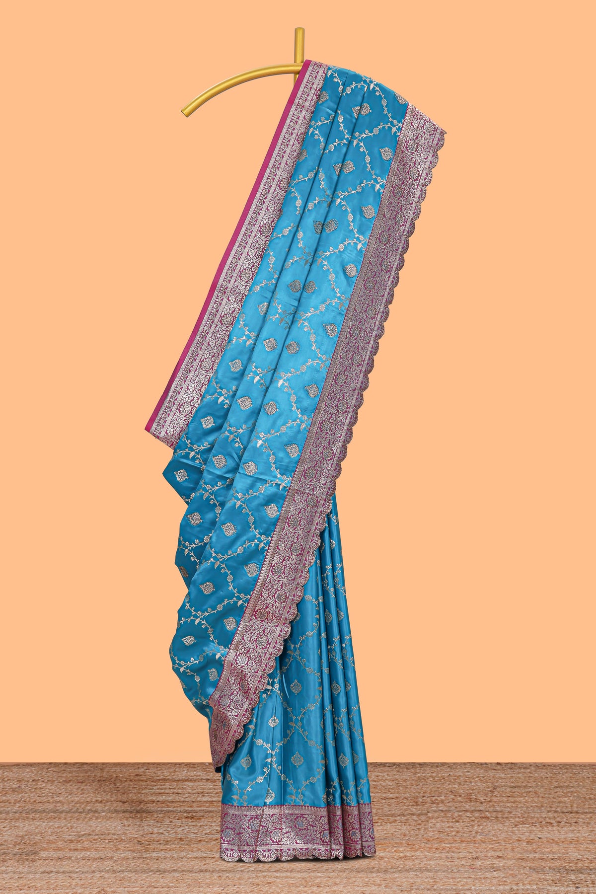 Peacock blue floral designed banarasi silk saree with self floral border and matching blouse