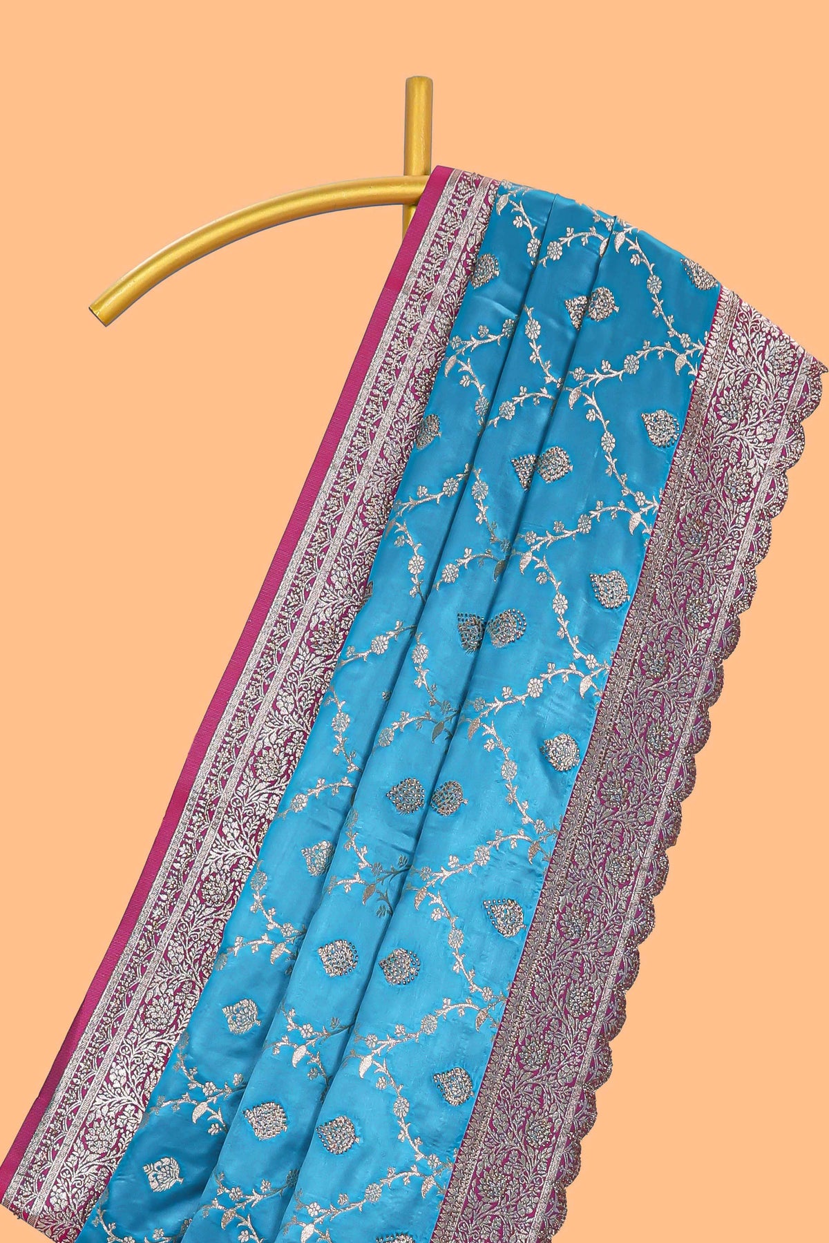 Peacock blue floral designed banarasi silk saree with self floral border and matching blouse
