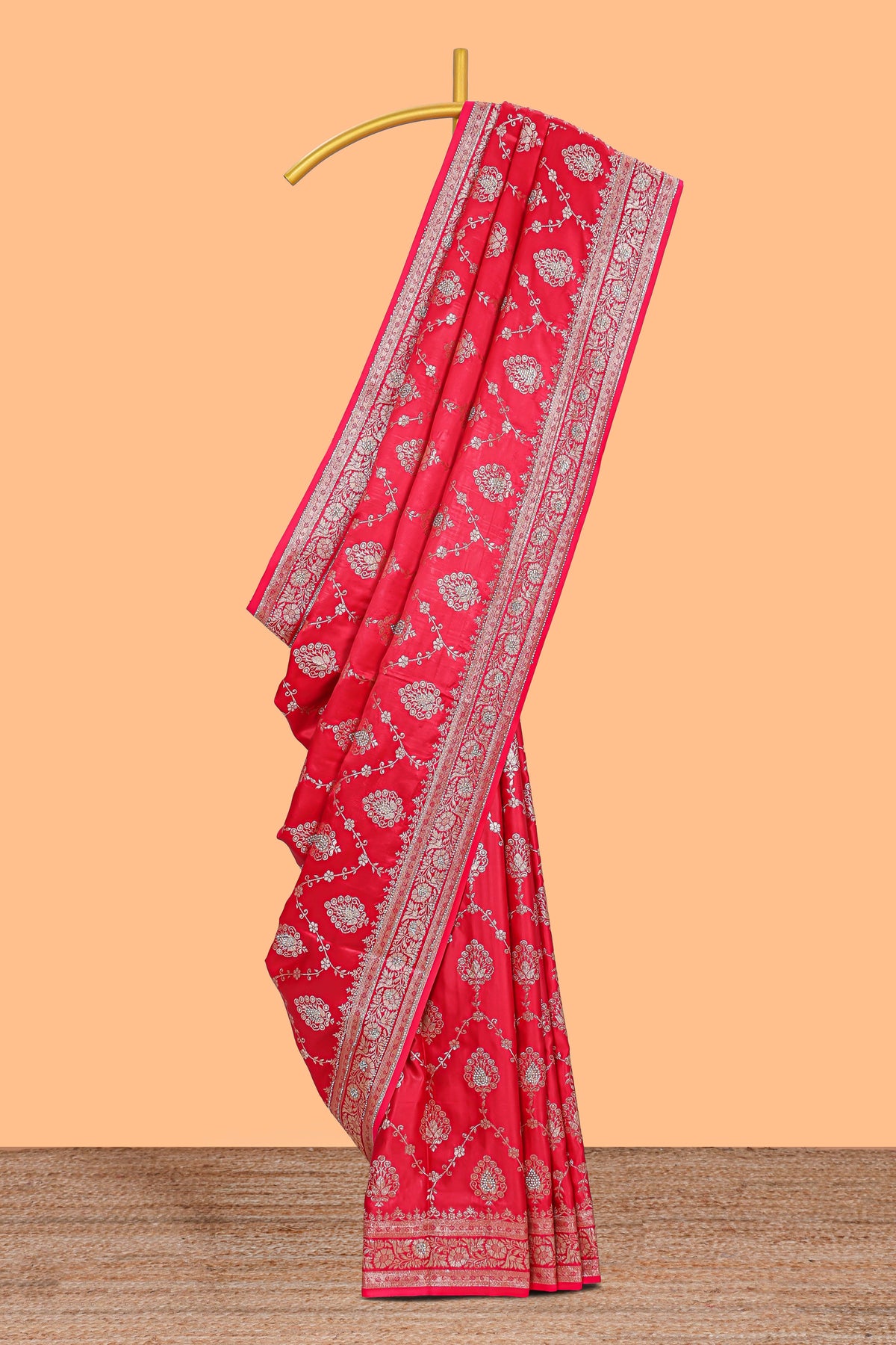Red floral designed banarasi silk saree with self floral border and matching blouse