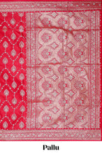 Red floral designed banarasi silk saree with self floral border and matching blouse
