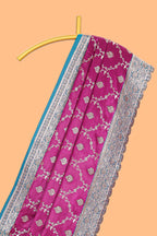 Deep magenta pink floral designed banarasi silk saree with contrast floral border and blouse